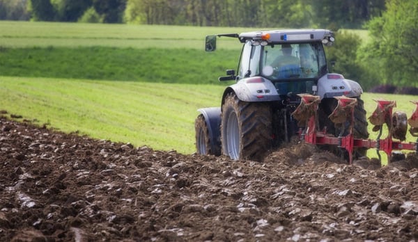 work in the fields with the tractor