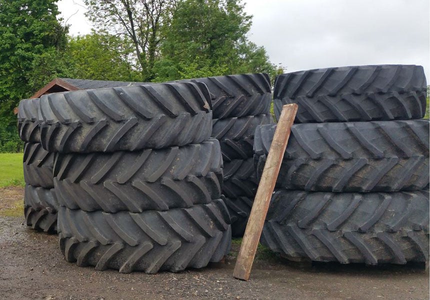 Bad agricultural tyre storage outside leading to accelerated ageing and deformed tyres