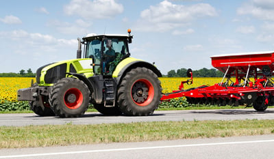 What are the solutions for less agricultural tyres wear on the road?